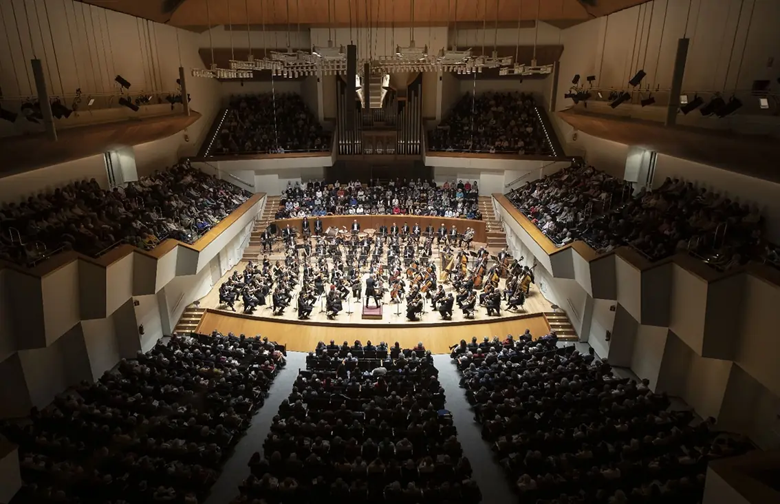 Concert band performing during a contest broadcast live